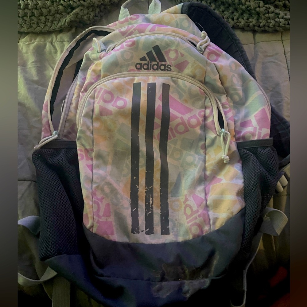 Multicolor Adidas backpack in used condition.